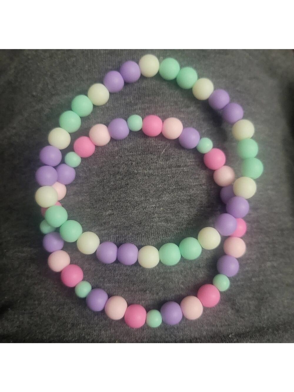 Pastel kandi colored stretchy beaded bracelets, lavender mint green pink white